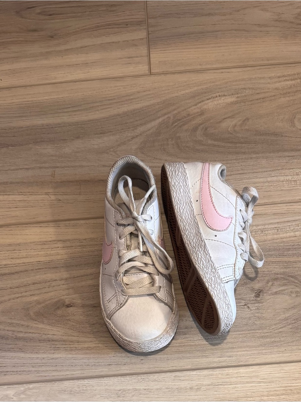 Nike Kids White Sneakers with Pink Swoosh